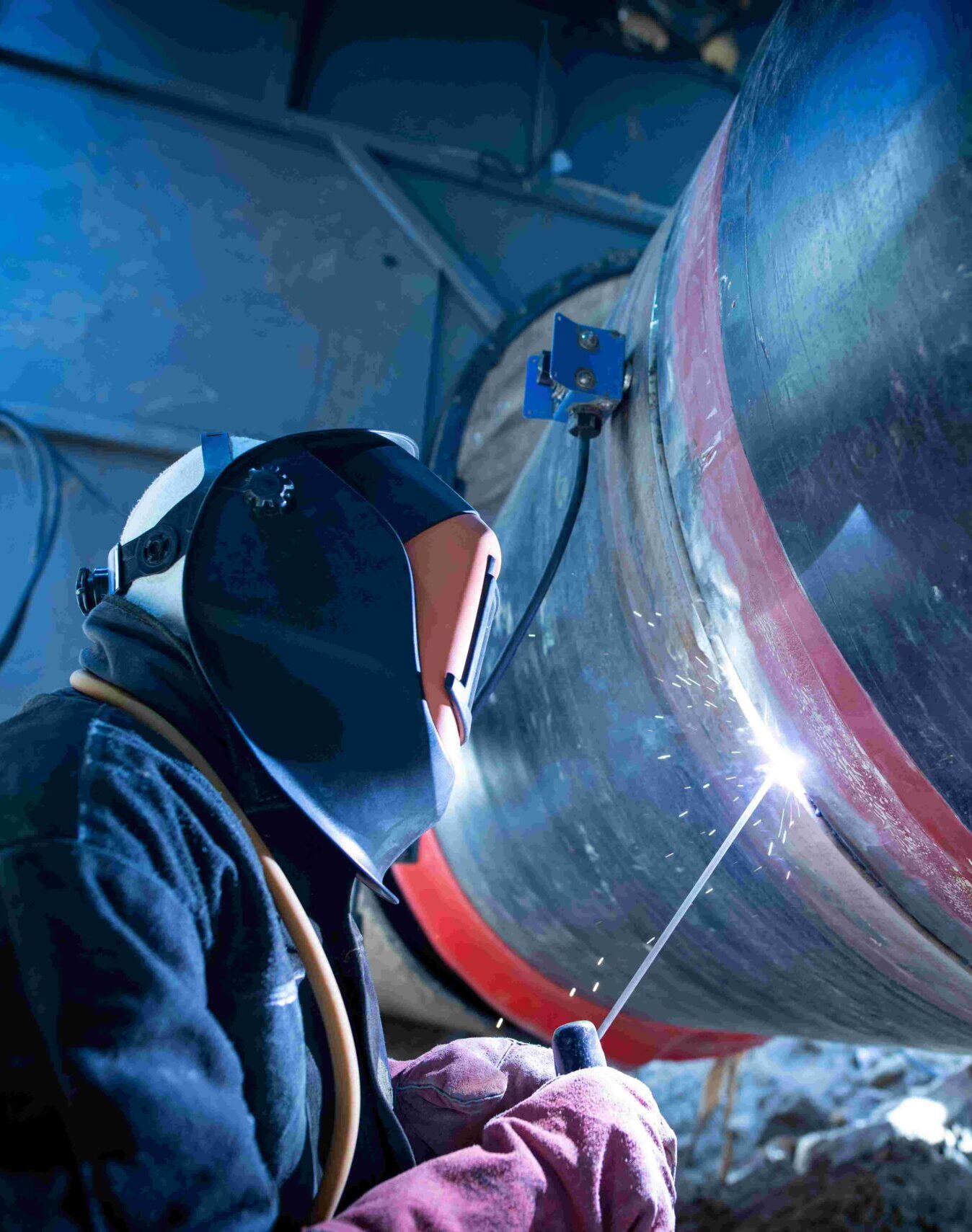 professional-welder-welding-pipe-pipeline-construction-compressed